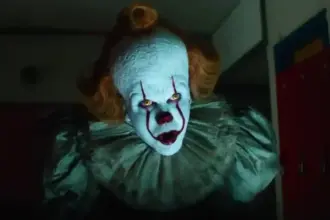 Imagem promocional de It: A Coisa com créditos de Stephen King.